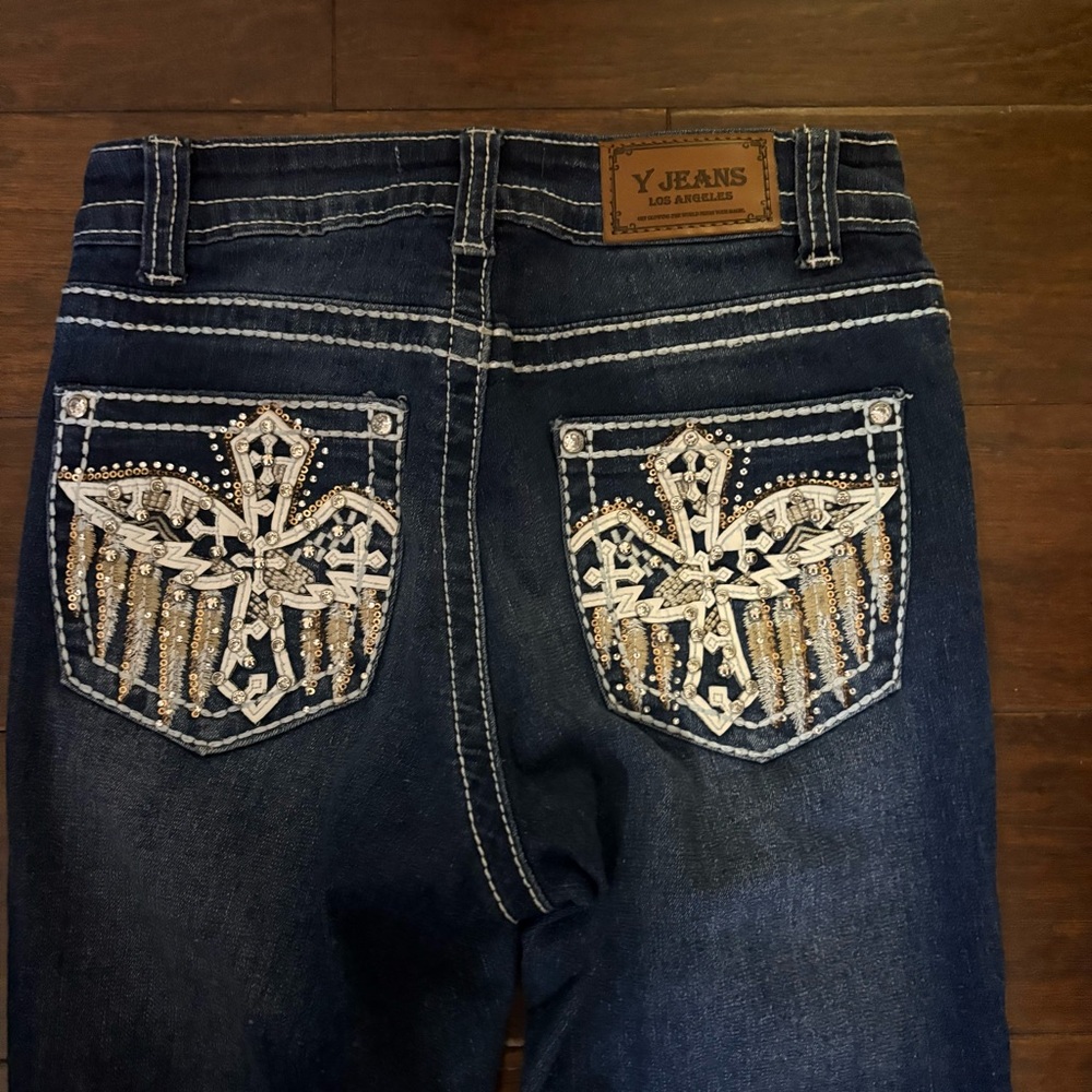 Blue Skinny Jeans with Whiskering and Distressed Details